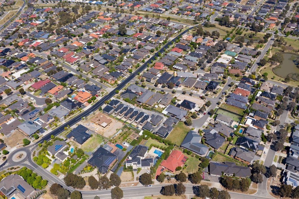 Aerial view of Australian suburban housing development showing residential blocks, property boundaries, and potential building envelopes for home construction